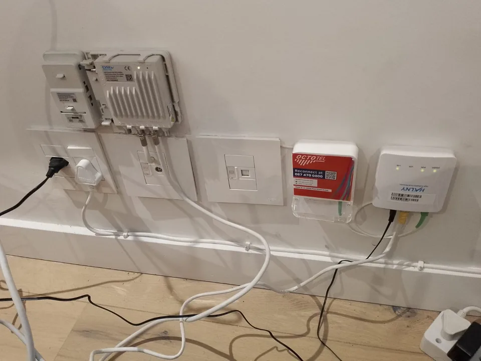 Signal distribution equipment, multiswitch and cabling on a wall